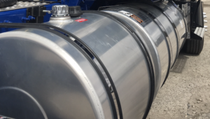a close up picture of a heavy trucks fuel tank